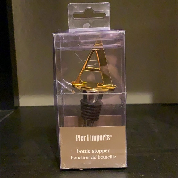 Pier 1 Imports gold “A” bottle stopper. NEW.